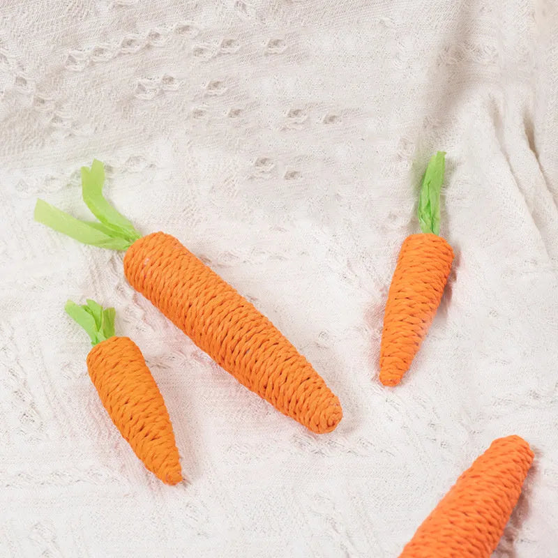 Bundle of cat toys including carrot chews, paper toys, ringing stones, sticks, and grinding sticks in S and L sizes.