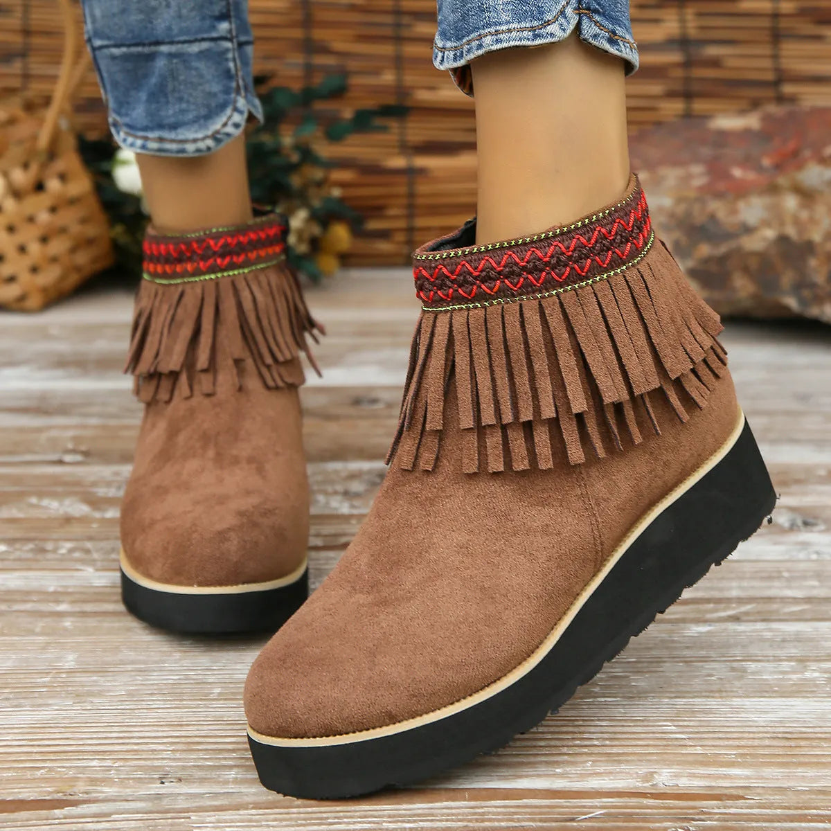 Women's black suede wedge bootie with thick platform sole and side zip.