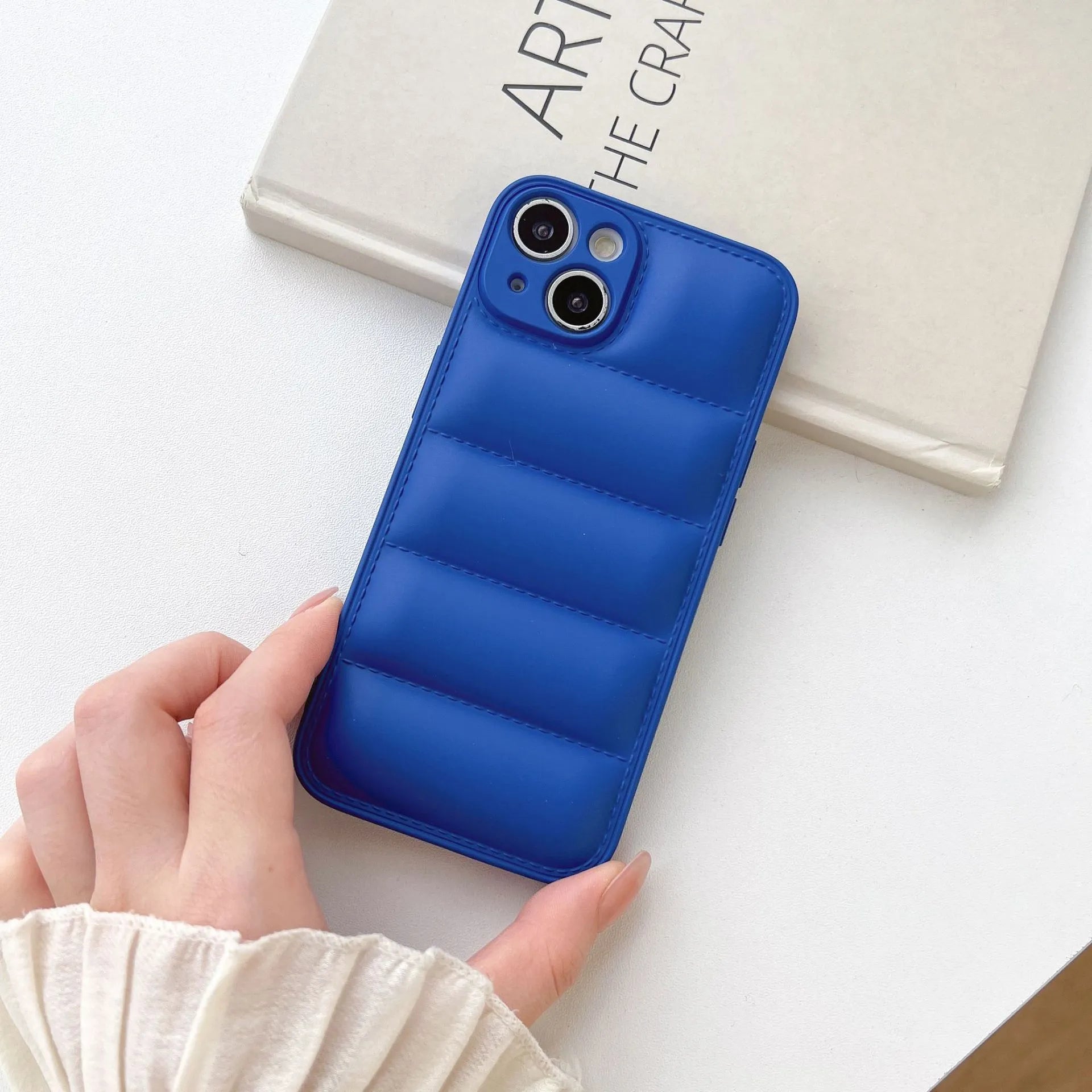 Plastic down jacket phone case for iPhone 15 series in black, shockproof TPU back cover