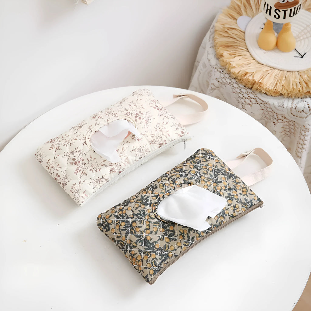 Canvas striped diaper pad in beige white, handheld design for travel baby changes