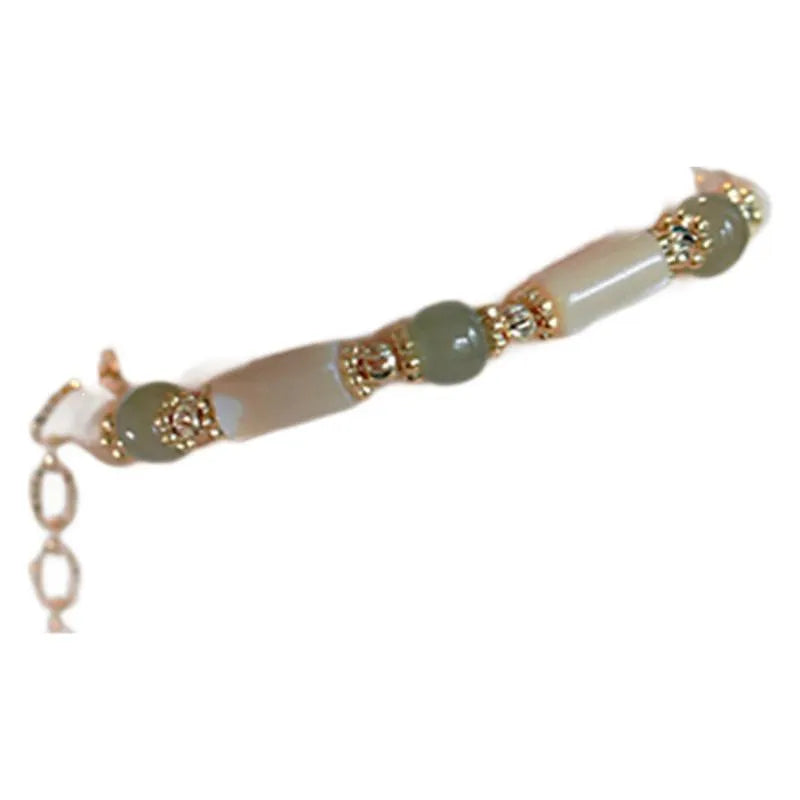 Women's natural white Hetian jade bracelet with lip shell design and round beads