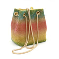 Soft rainbow rhinestone bucket bag with adjustable metal chain strap on a 28cm circular base.