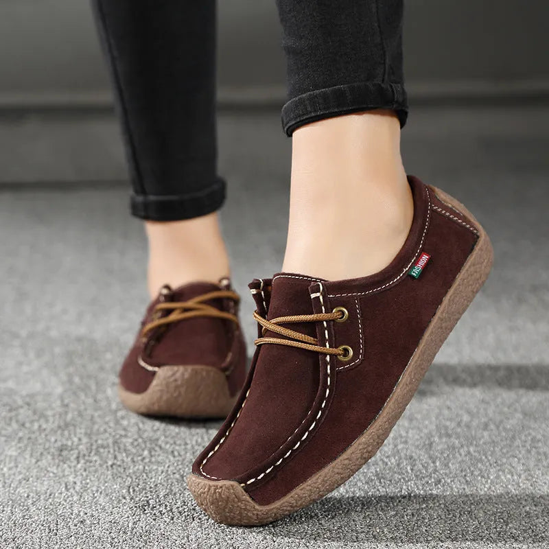 Women's lace-up flat shoes with frosted upper, rubber sole, round toe, and front-tie fastening