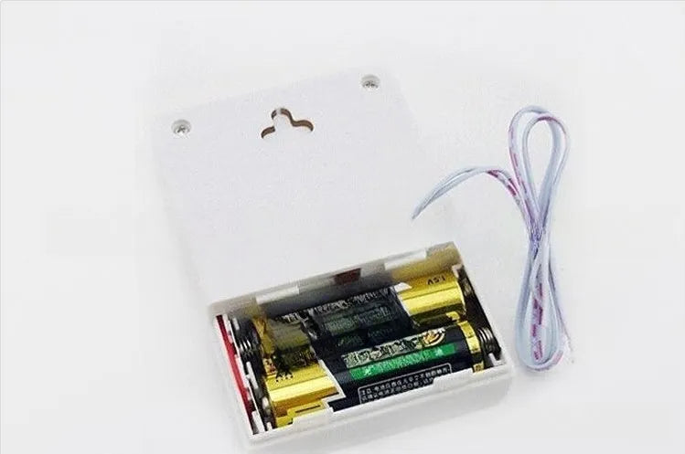 White wired dingdong doorbell 87x62x23mm on a wooden door frame