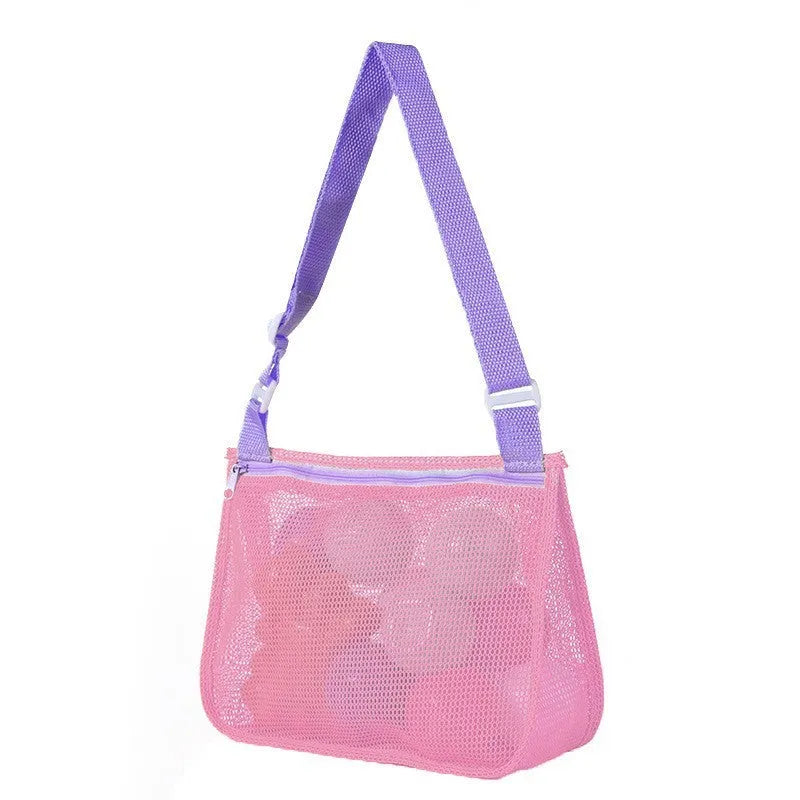 Blue nylon mesh travel storage bag with black handle and zip seal for children's clothing organisation