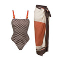 Women's dot pattern one-piece swimsuit with matching wrap skirt set