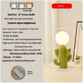 Green cactus button 3W plug-in bedside lamp on a modern nightstand