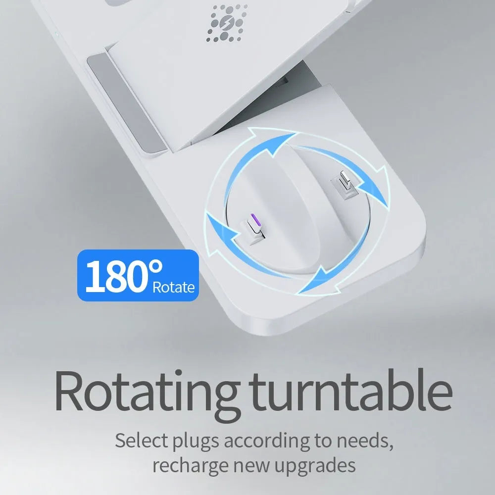 White three-in-one wireless charging station for mobile phone, headphones and smartwatch on a desk.