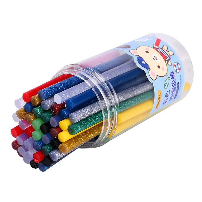55 transparent EVA hot melt glue sticks in packaging measuring 63 × 121mm