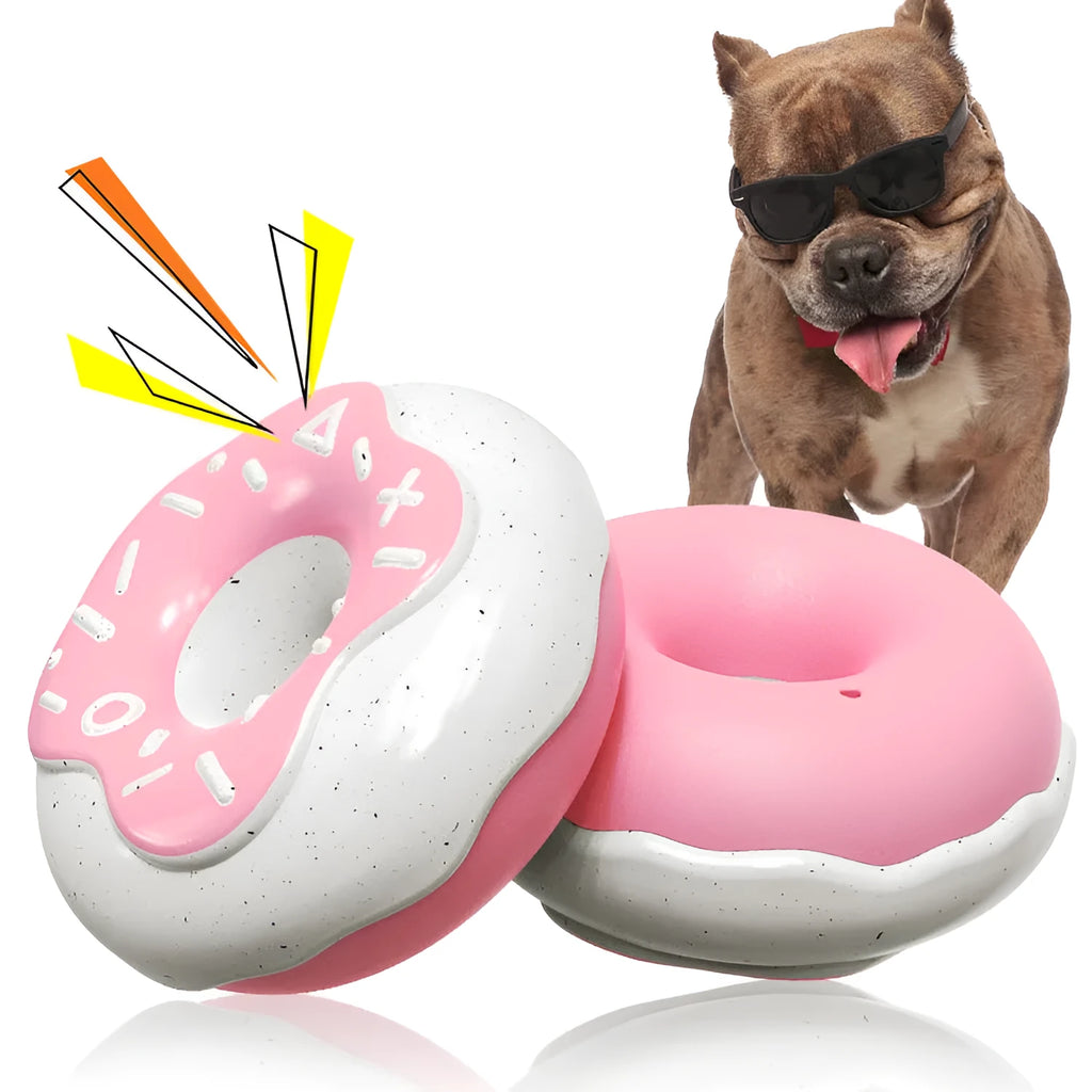 Pink, yellow, and chocolate coloured TPR donut dog chew toy with squeaker for teeth cleaning.