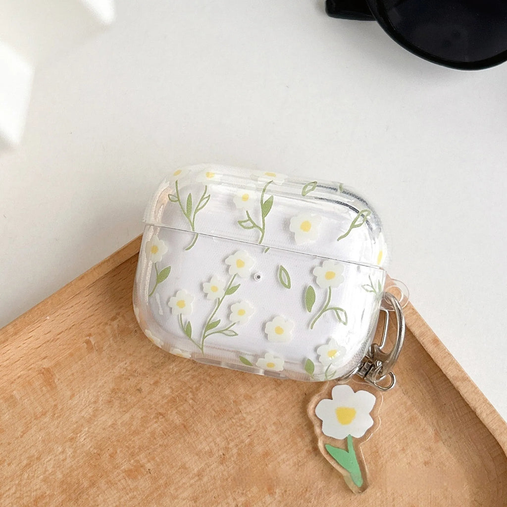 Transparent white floral patterned TPU protective case for Apple AirPods charging case.
