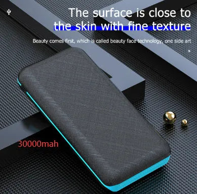 Solar power bank with wireless charging surface, three USB ports, and LED flashlight in black colour