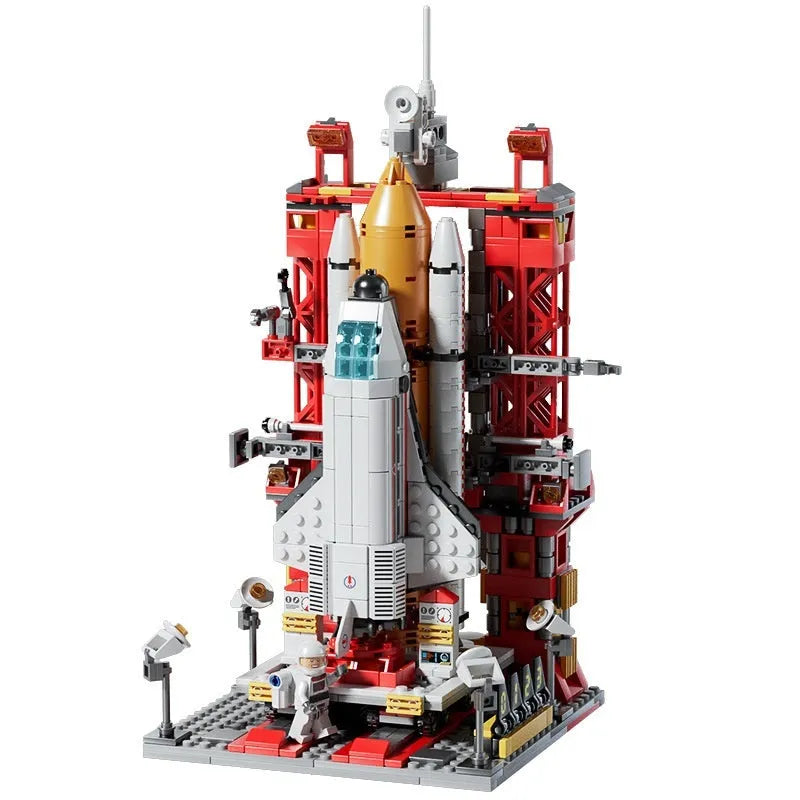 Colour box packaging of space rocket building blocks featuring space station, starship, Apollo 5, Falcon Heavy rocket, and dragon flying ship sets