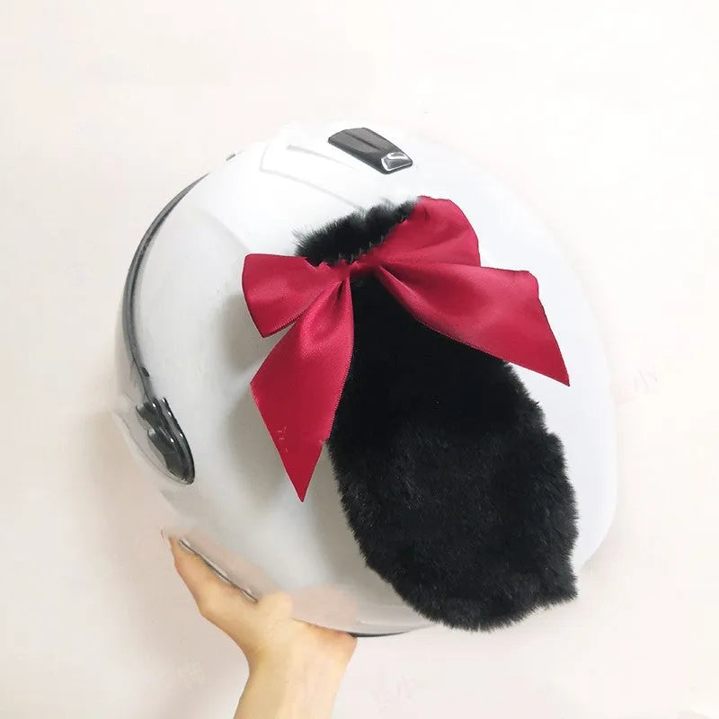 Carbon fibre rabbit ears motorcycle helmet decoration in multiple colours on a black helmet.