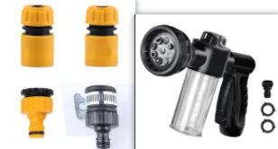 Green high-pressure foam spray gun with adjustable nozzle and attached water hose for car and garden cleaning.