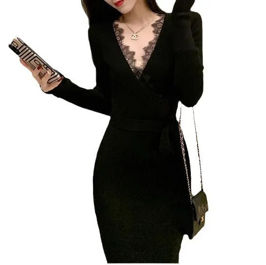 Women's solid black slim fit wool princess dress skirt on a hanger.