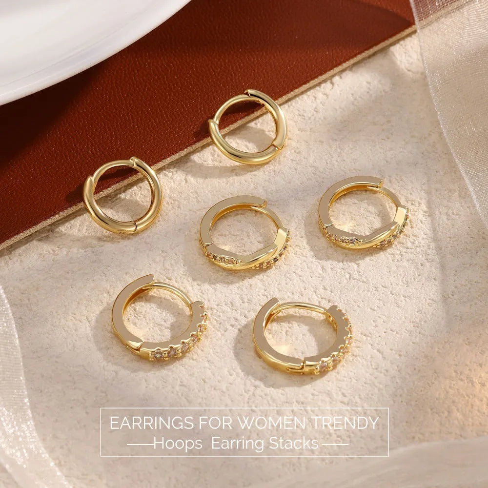 Twist copper earrings with inlaid zircon in gold or silver, shown as a 3-piece or 6-piece set per ear