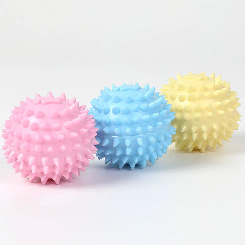 6cm TPR dog chewing ball with textured footprint surface in blue, pink and yellow colour options