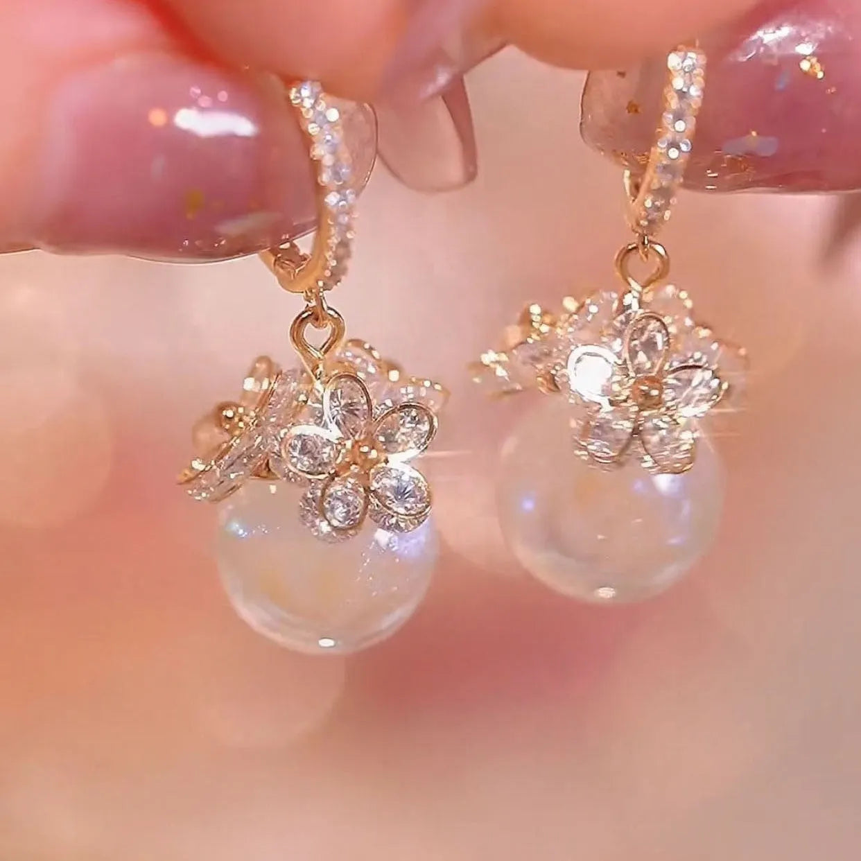 Geometric copper zircon earrings with rose design element in electroplated finish
