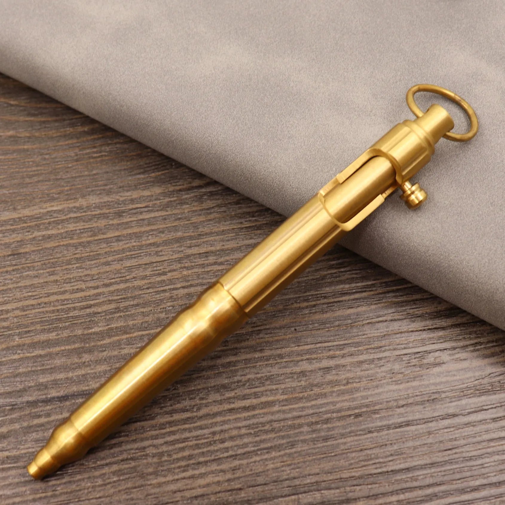 Brass tactical pen with retro colour finish and press mechanism