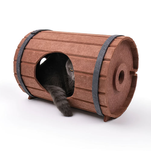 Assembled wine barrel shaped cat bed made from brown felt with a circular opening, shown beside its three flat felt pieces and binding straps.
