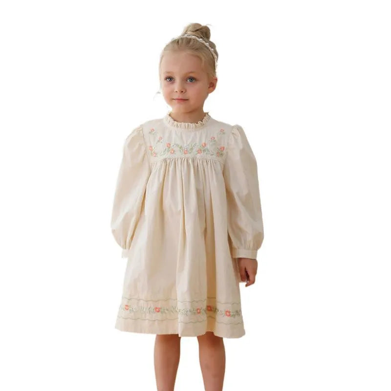 Girls apricot dress with flower embroidery, puff sleeves, and cotton lining, available in heights 90cm to 140cm