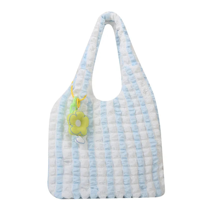 Women's soft pleated bubble shoulder bag in a vertical square shape with a detachable pendant charm.