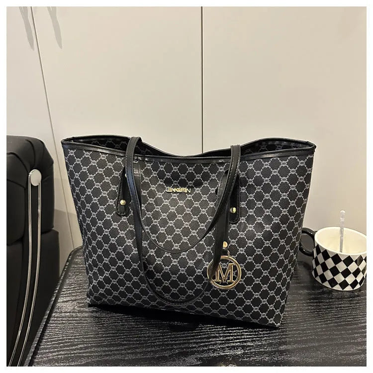 PU leather shoulder bag with sewing thread detail in black, shown with measurements.