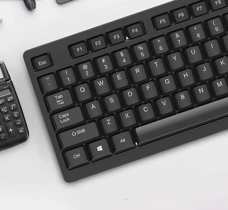 KM160 black wired USB keyboard and mouse set with 1.5m cable on desk