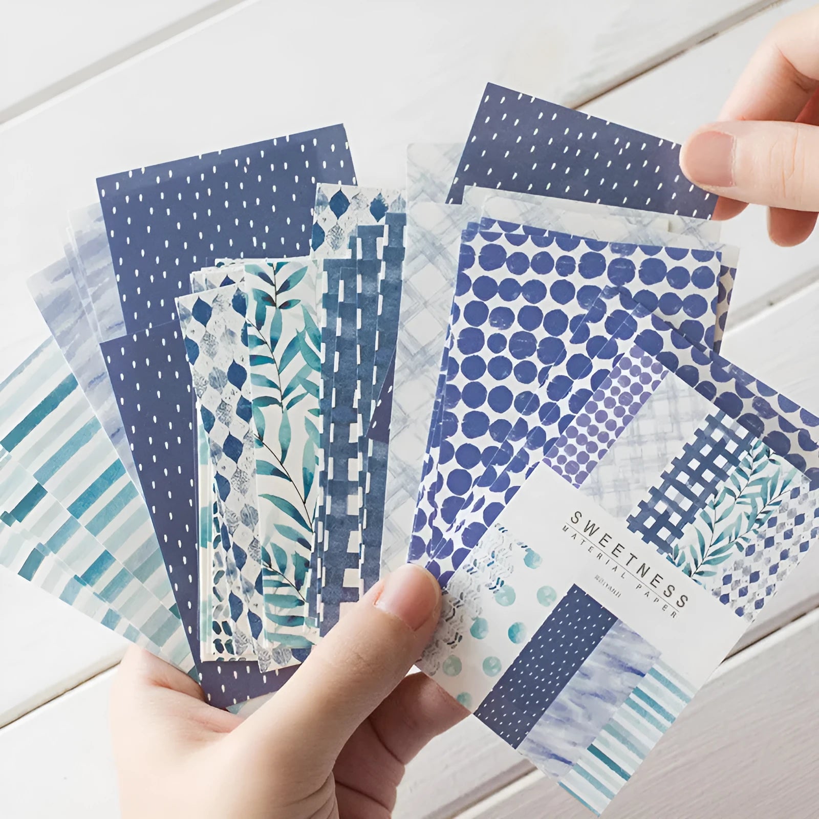 Assorted retro dessert-themed note papers in colours like caramel puff and strawberry coconut, 50 sheets per pack.