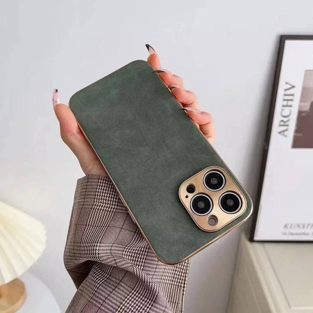 Leather texture grey-green TPU phone case fitted on an iPhone showing precise button and camera cutouts.