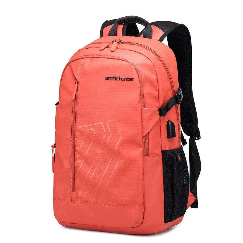 Blue plaid 18 inch laptop backpack with curved shoulder strap showing front pocket.