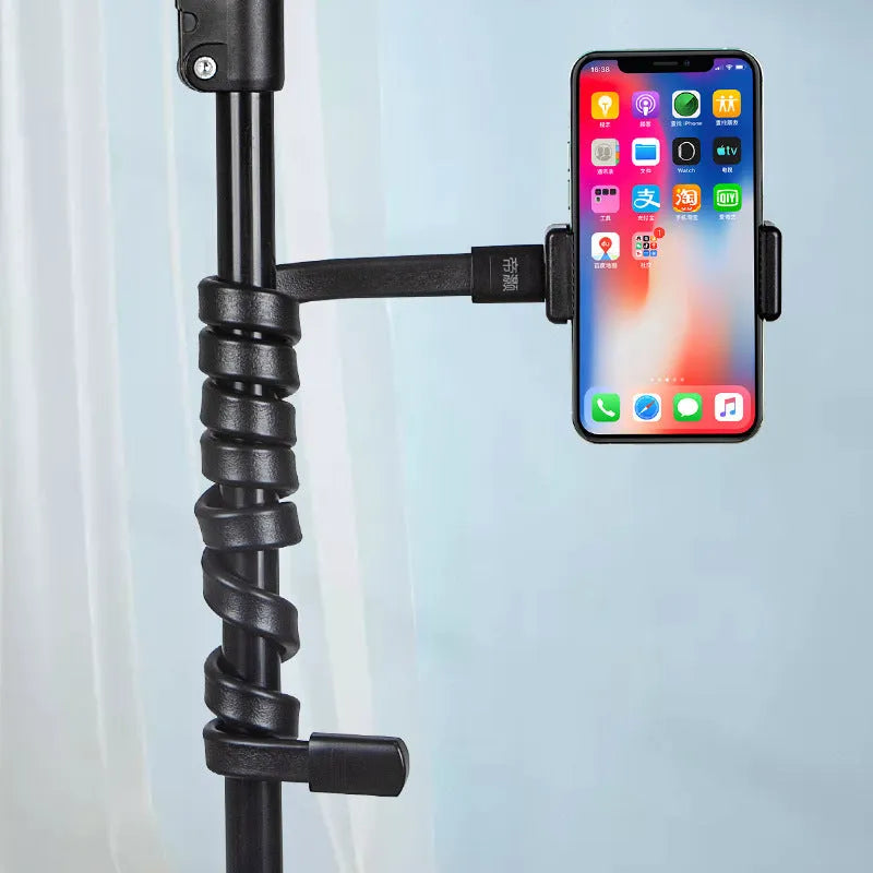 Flexible adjustable silicone and aluminium hose phone holder bent into an S-shape.