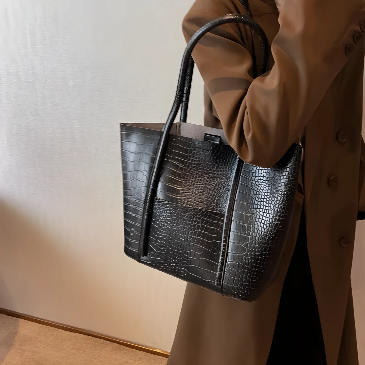 Large capacity PU leather tote bag with embossed texture, soft handle, and horizontal square shape, in black.