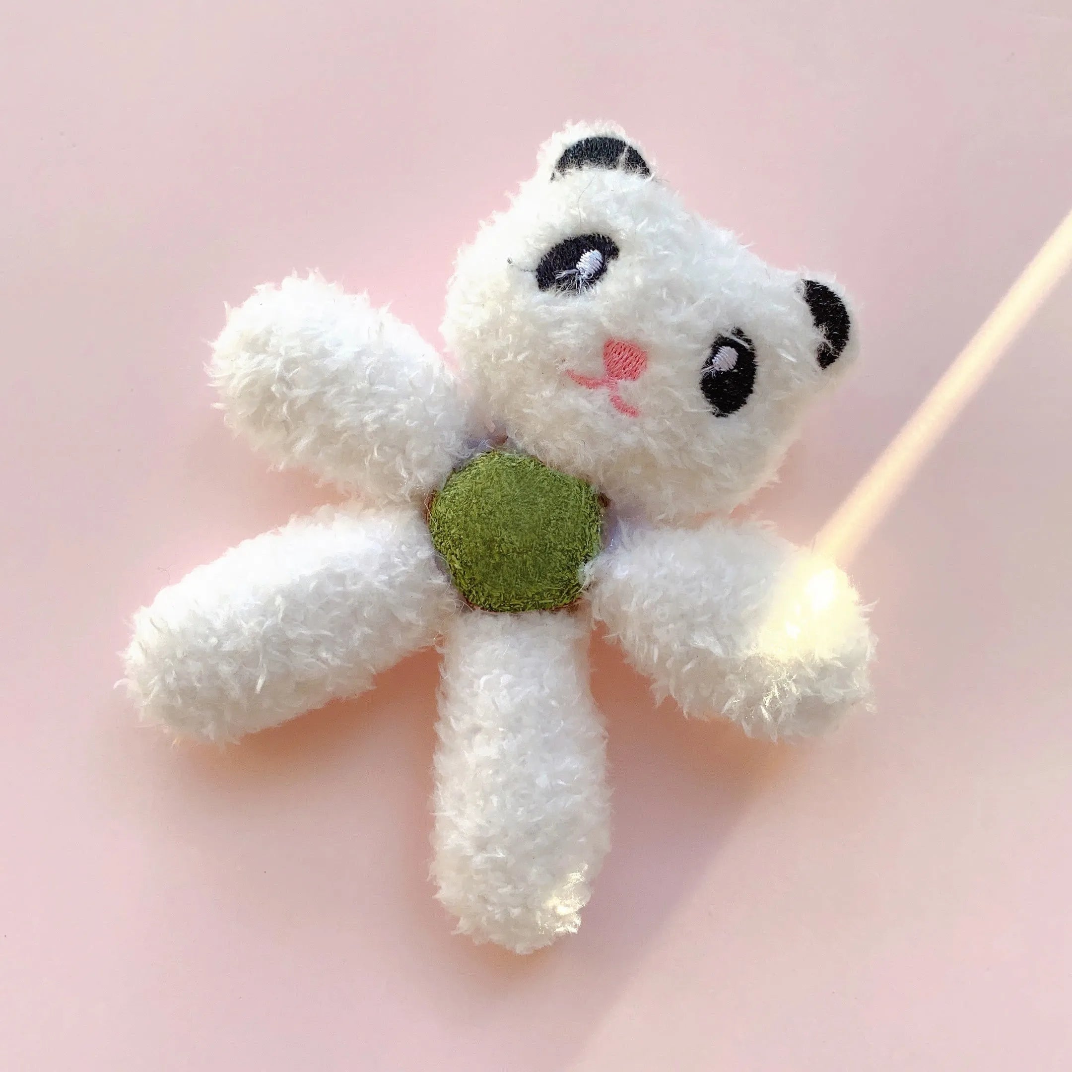 Catnip chewing ball toy in animal designs for dental cleaning and interactive play