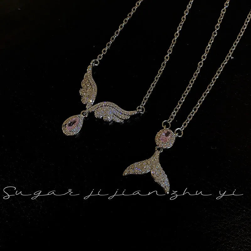 Women's S925 sterling silver adjustable necklace with choice of angel wing or fishtail pendant on O-ring chain