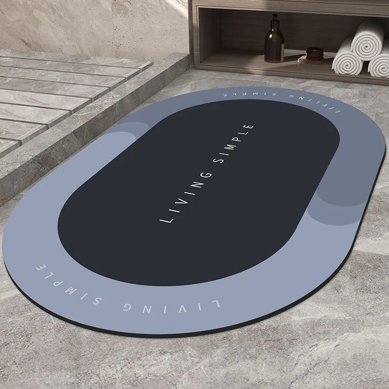 Super absorbent oval bath mat in grey with non-slip rubber bottom, 40x60cm