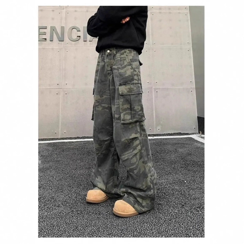 Men's washed camouflage print cargo trousers with multiple pockets and a mid waist design.