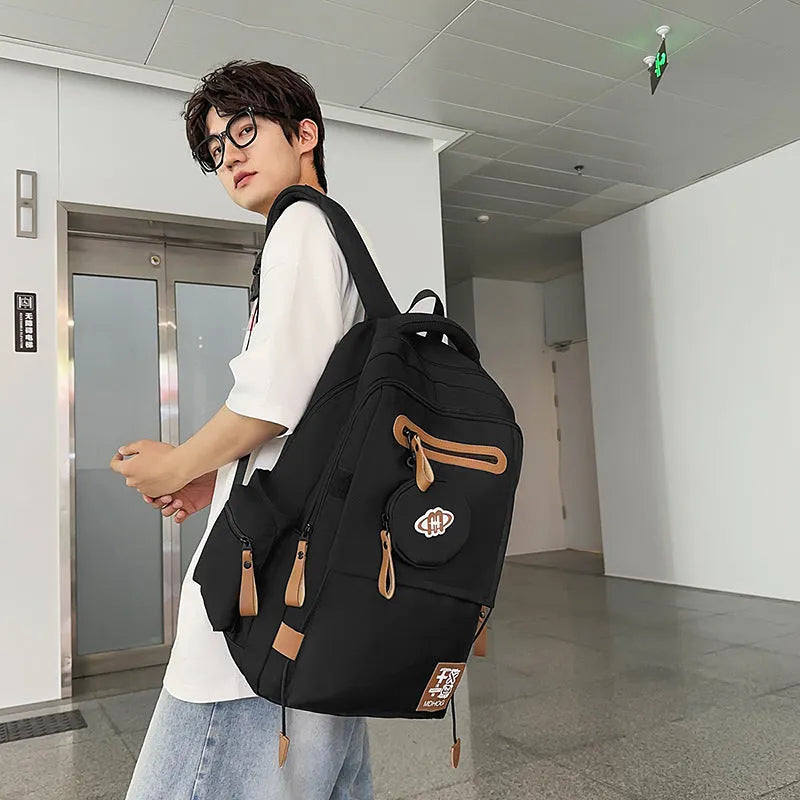 Large waterproof nylon leisure travel backpack in multiple colours with contrast stitching details