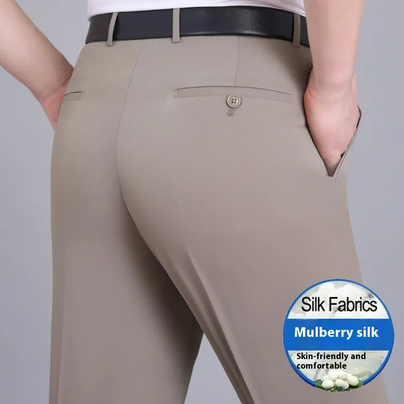 Men's straight-leg mulberry silk blend business trousers in dark blue on a hanger.