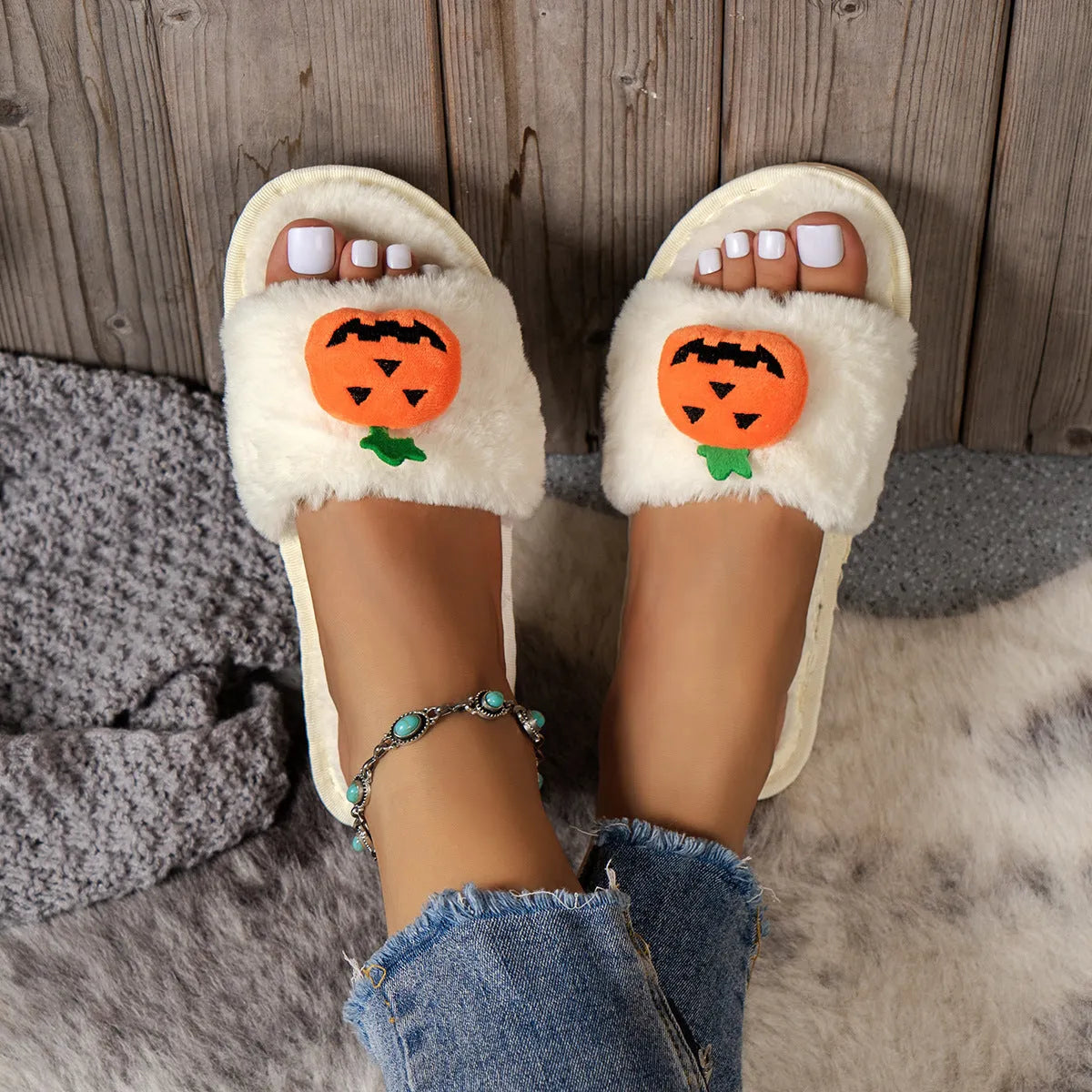 White and yellow pumpkin plush open toe slippers with synthetic fur uppers and PVC soles