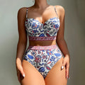 Blue women's high-waisted push-up bikini swimsuit with sleeveless design for swimming
