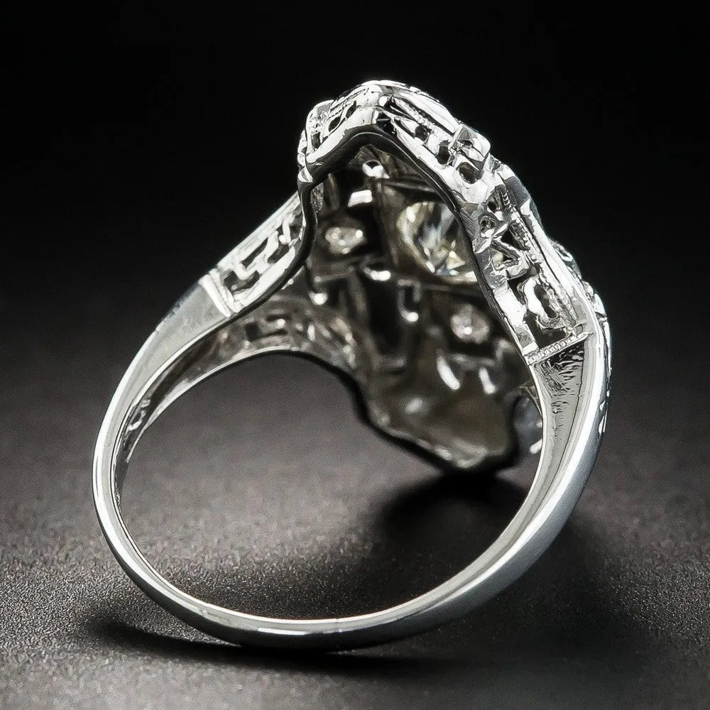 Hollow geometric silver-coloured ring with diamond studs on copper base