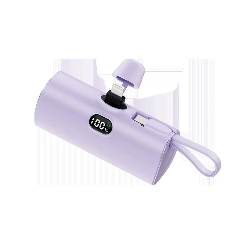 Compact rectangular power bank with digital screen, shown in blue colour, displaying battery percentage, with folding plug unfolded.