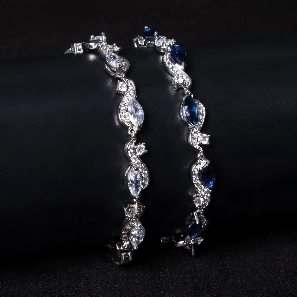 Zircon line bracelet in copper with geometric inlaid design, shown in blue or white for women