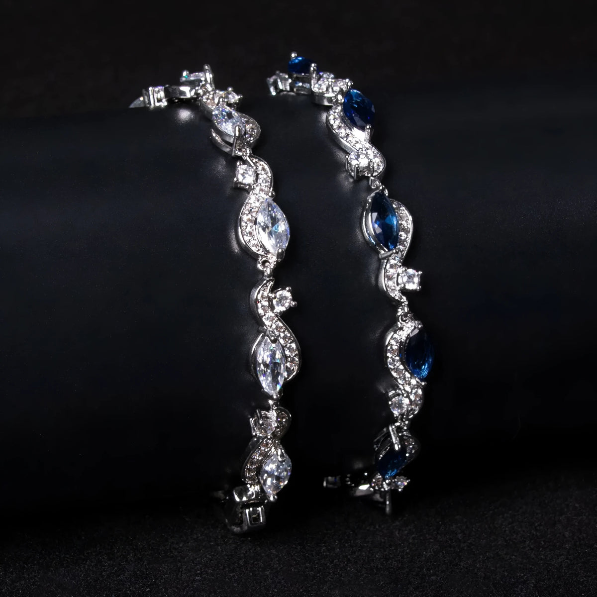 Zircon line bracelet in copper with geometric inlaid design, shown in blue or white for women