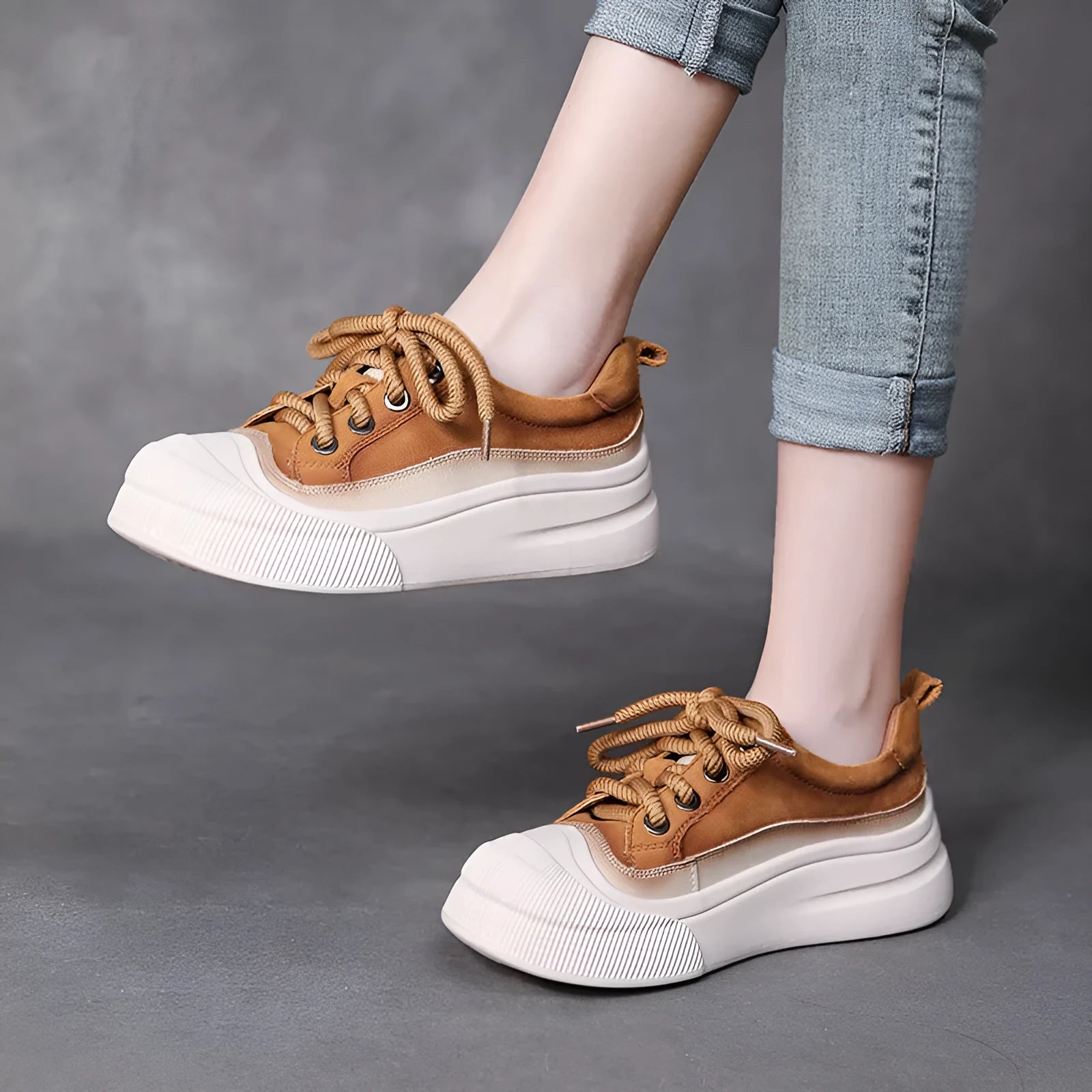 Women's yellow and cameo brown round-toe lace-up casual shoes with cow leather uppers.