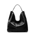 Brown genuine leather tote bag with contrast stitching and large capacity, front view on white background