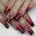 Wine red gradient false nail tips with plaid pattern in long ballet style with jelly glue