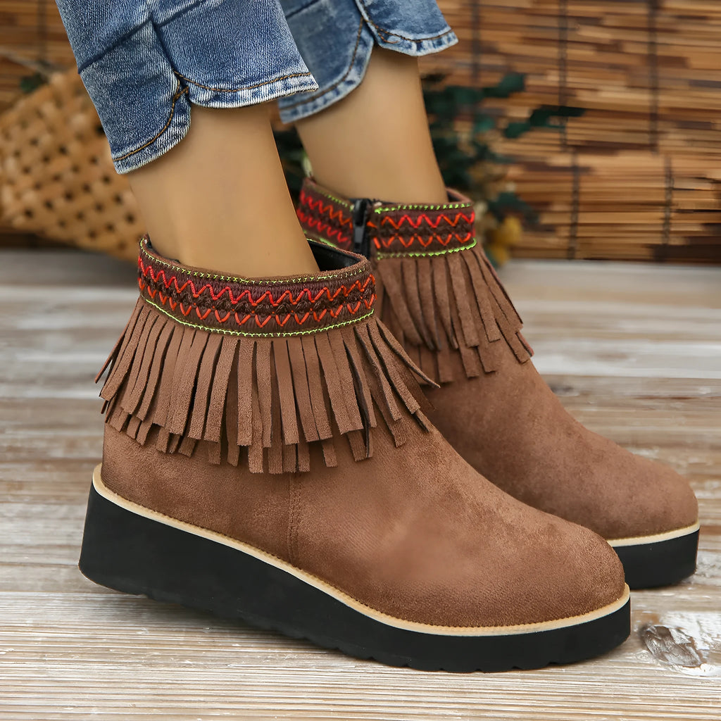 Women's suede wedge ankle boots with side zip and tassel detail in dark brown.